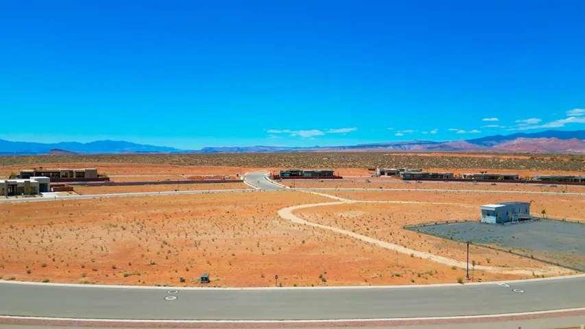 Expansive desert landscape with paved roadways