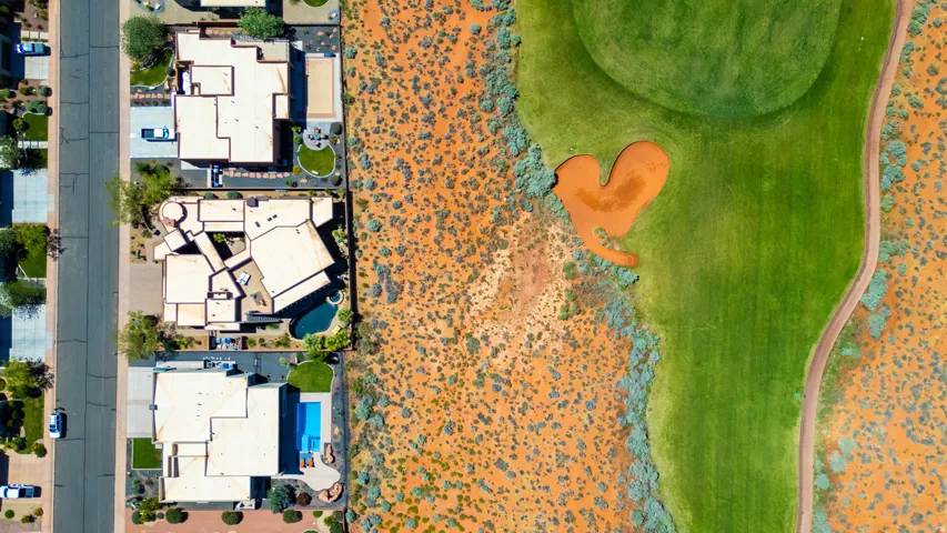 Aerial perspective showcasing golf course frontage with a heart-shaped sand trap