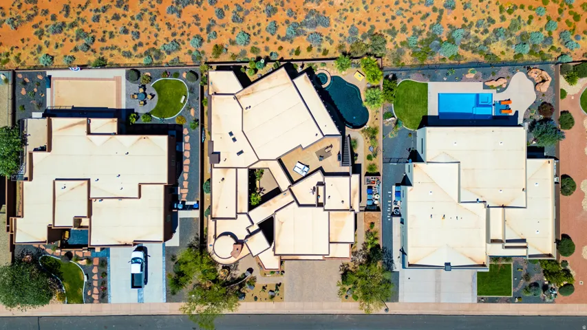 Aerial overview showcasing three properties, each featuring distinct outdoor amenities
