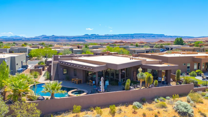 Contemporary stucco exterior with a flat roofline