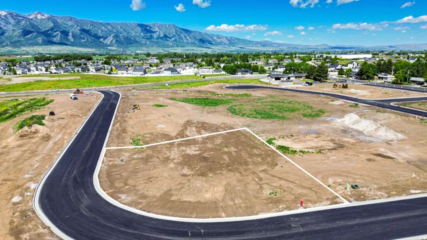 New residential development featuring paved roads and curb cuts
