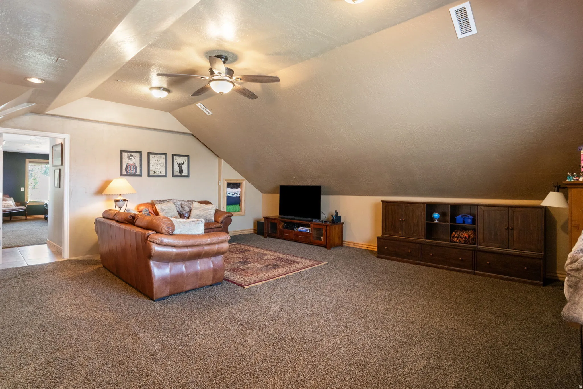 Loft style family room perfect for extra hang out space.