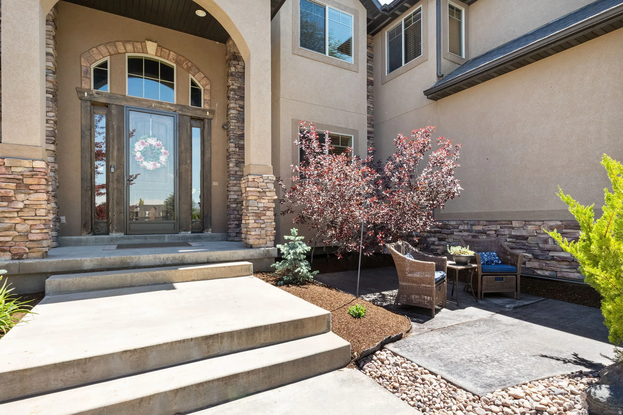 Grand entryway with private patio.