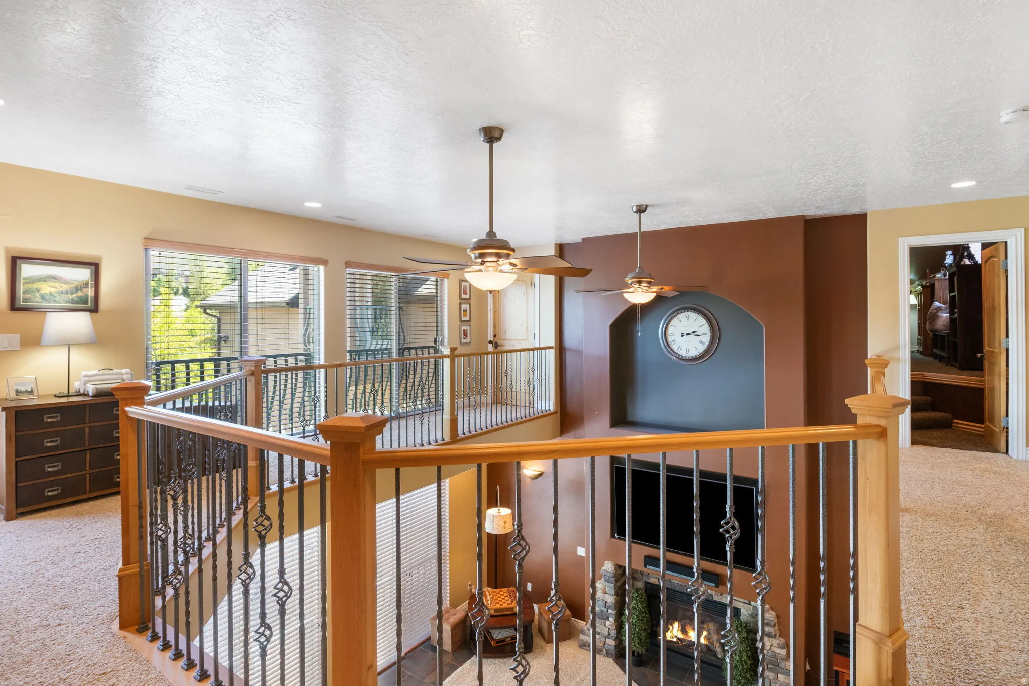 Upper loft area on the 2 story ceilings on the main floor family room providing tons of natural light!