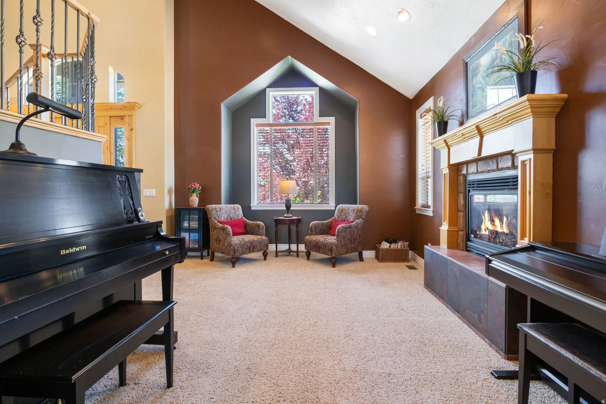 Moving from library to formal living room. Ample space for relaxing in front of the fireplace.