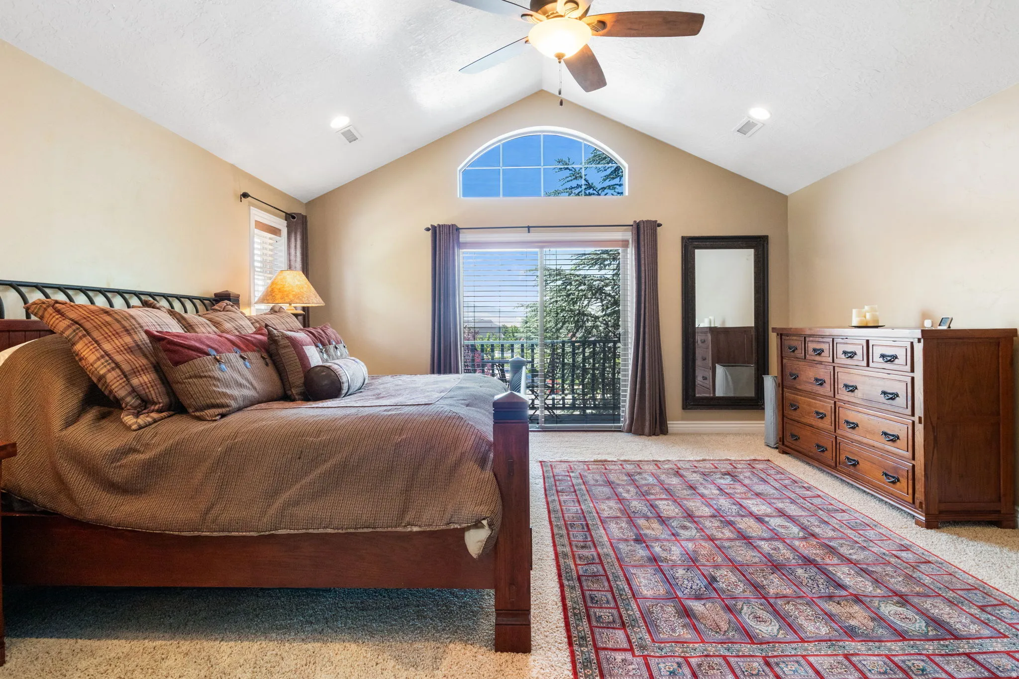 Spacious primary suite with private balcony.