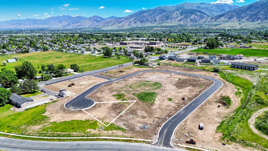 Developed land parcel with newly paved roads and clear lot demarcation