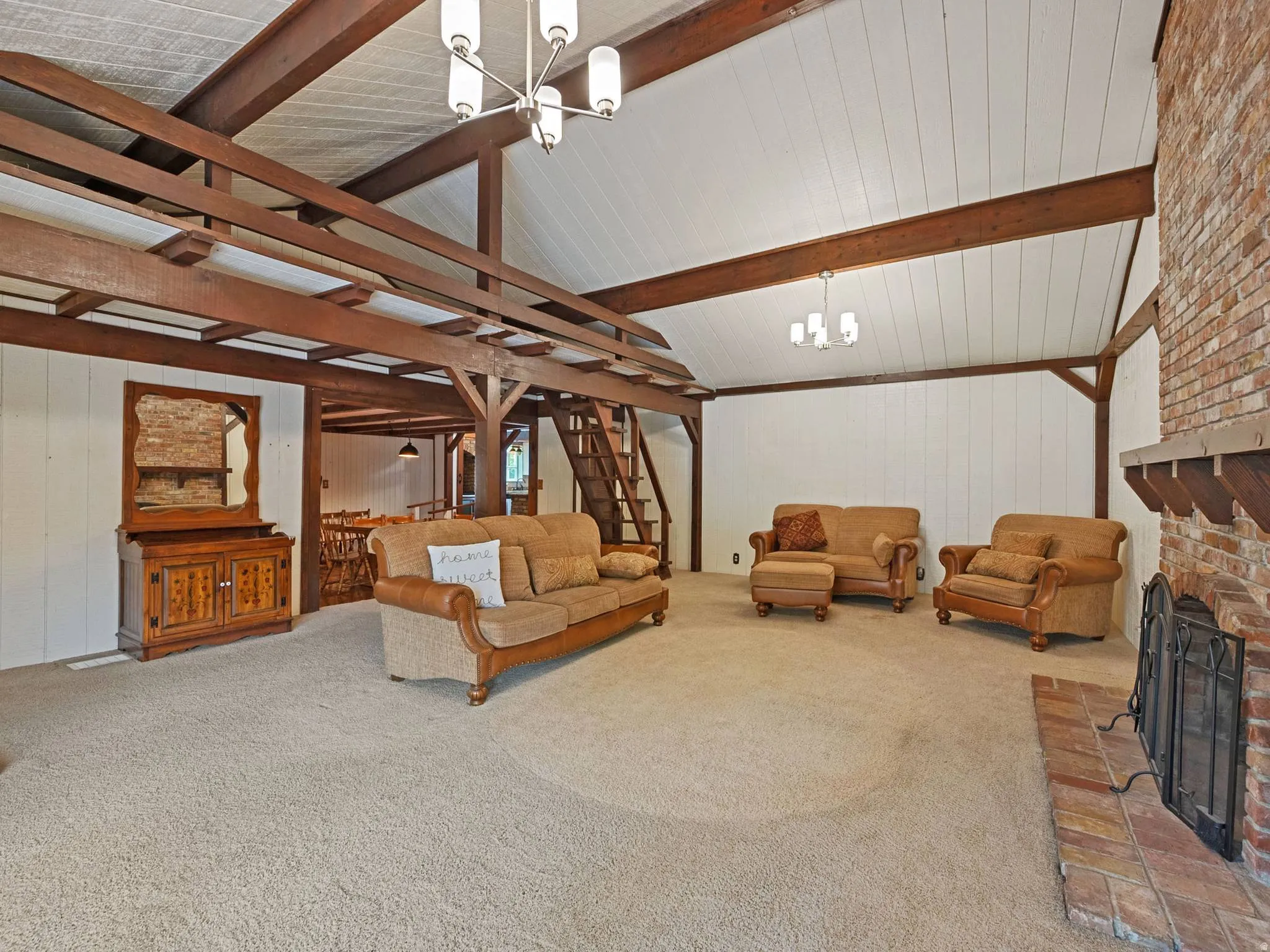 Another view of main living room featuring a loft.