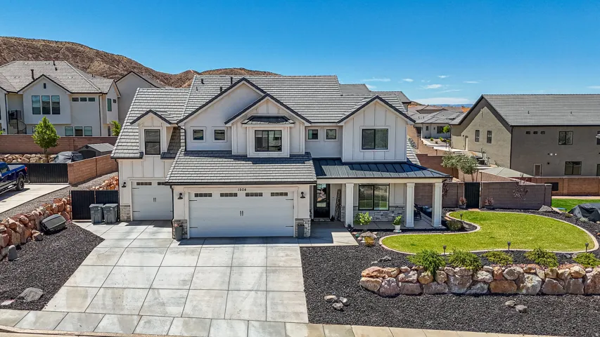 Contemporary two-story residence with a multi-gabled roofline and board-and-batten siding