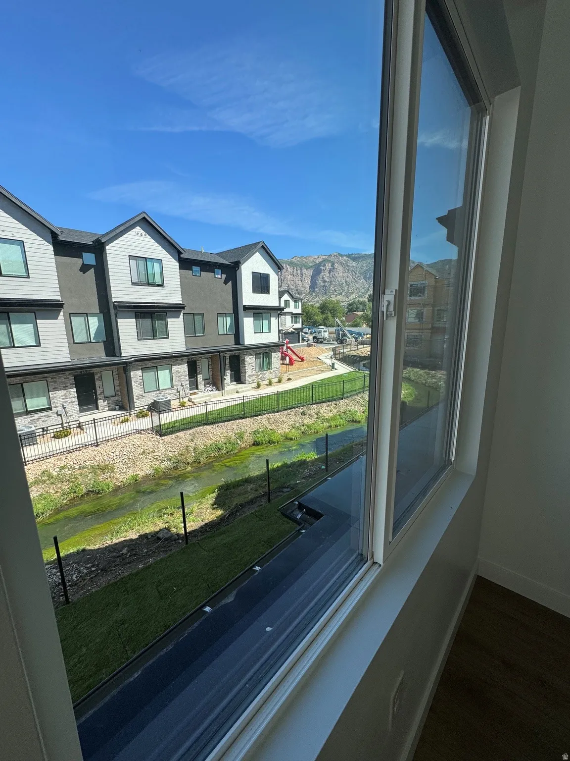 View from Primary suite to creek and the mountains