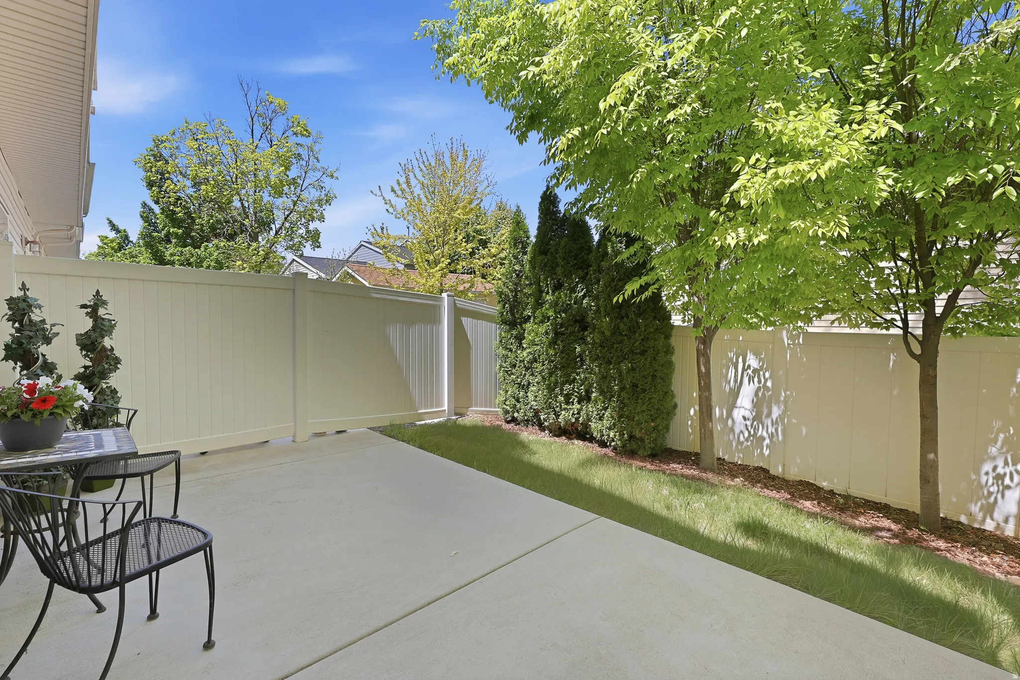 Concrete patio offering an outdoor living space