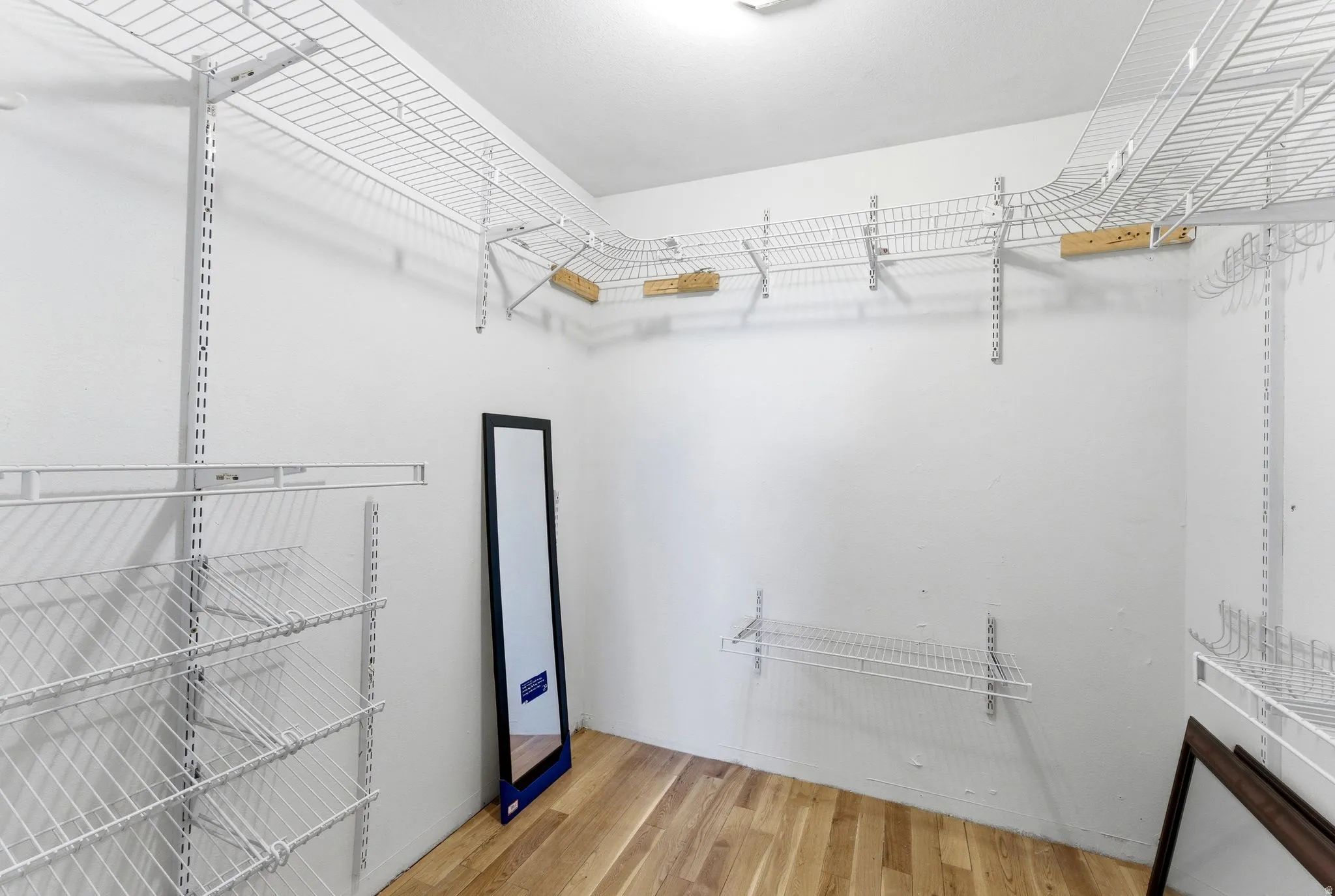 Primary suite walk-in closet.