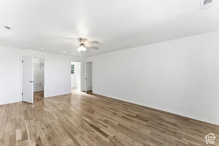 Spacious primary suite with walk-in closet.