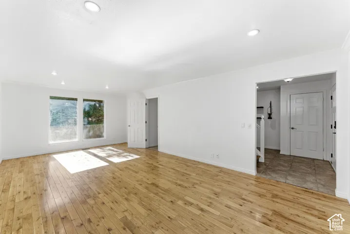 Spacious living room with hardwood floors