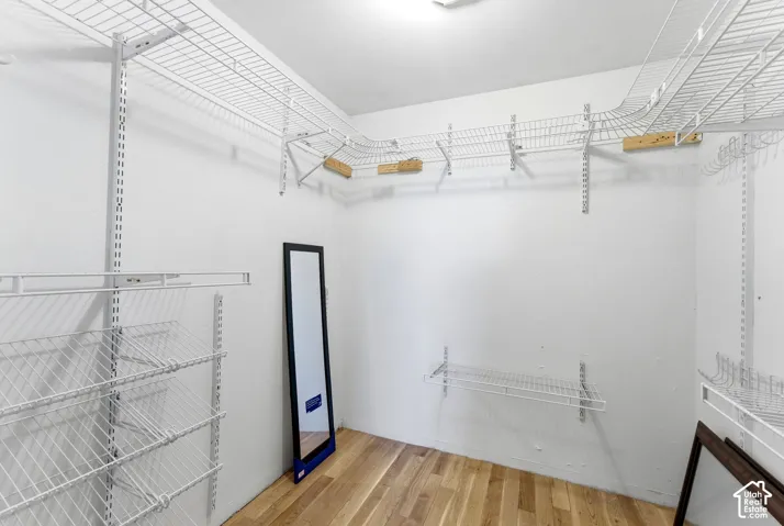 Primary suite walk-in closet.