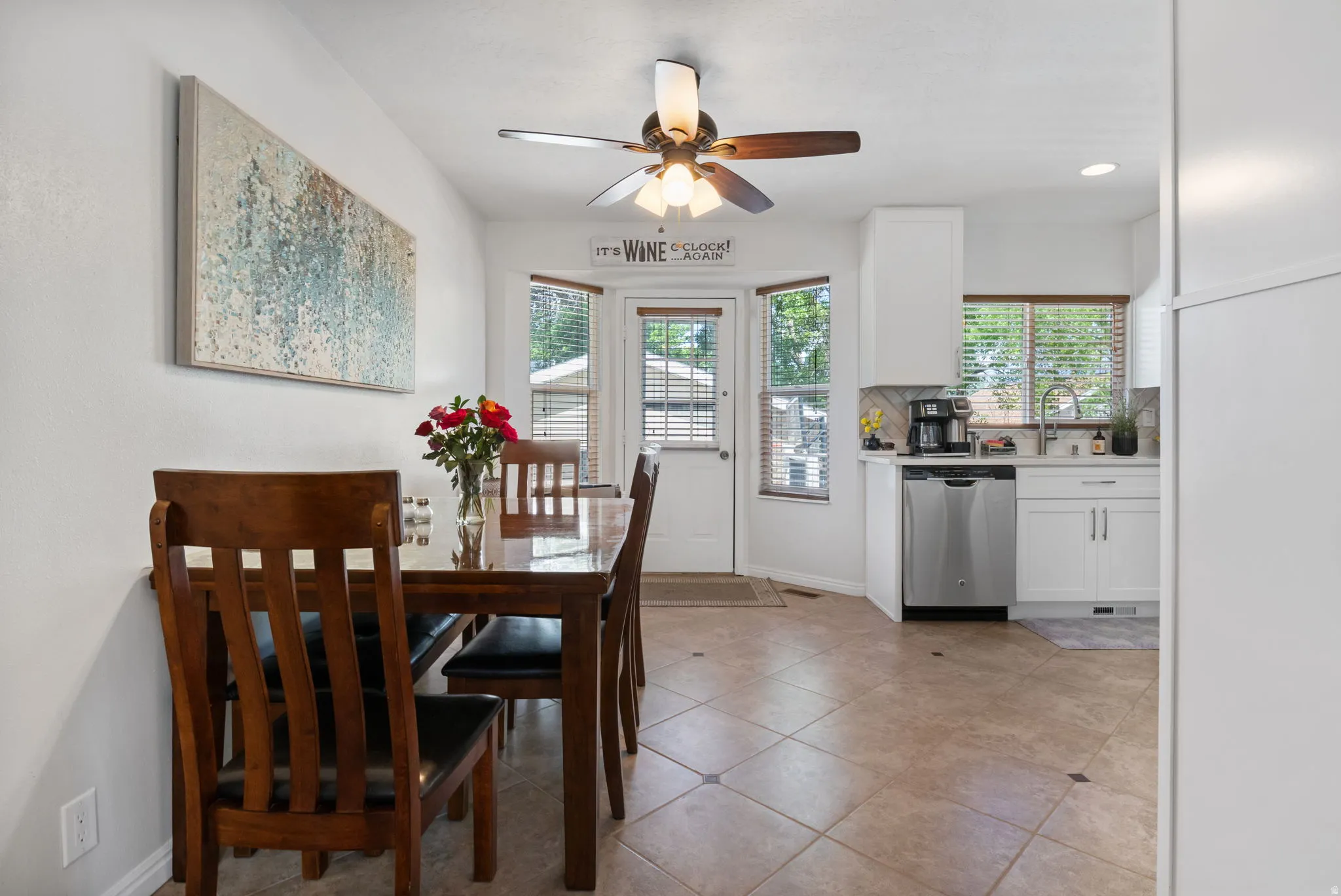 Open-concept space featuring a dining area and kitchen