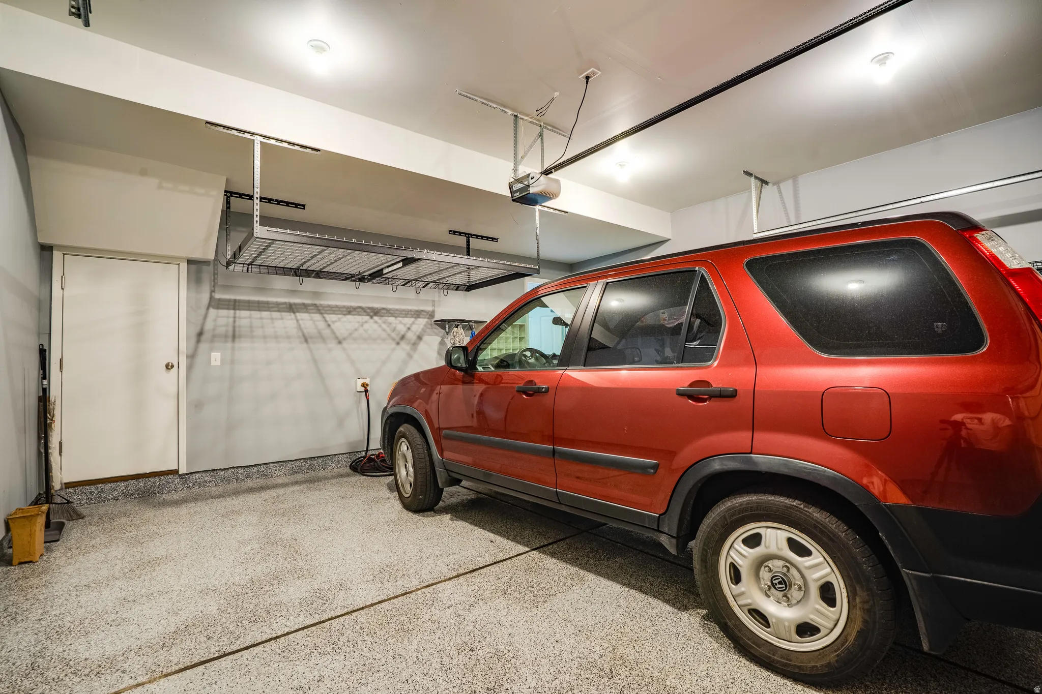 Attached garage with epoxy-coated flooring