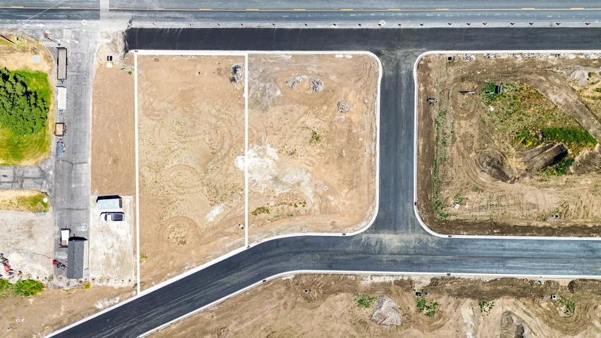 Aerial perspective showcasing multiple undeveloped lots with defined boundaries