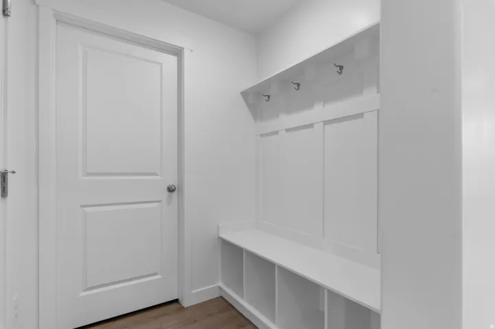 Built-in hall tree with integrated storage cubbies and coat hooks