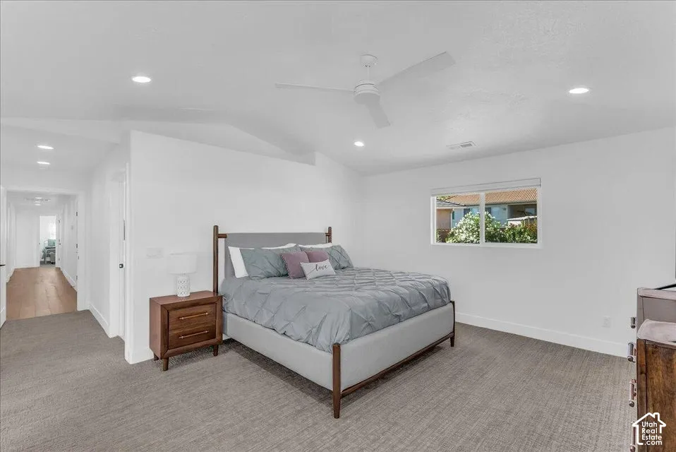 Spacious room featuring neutral carpeting and a large window