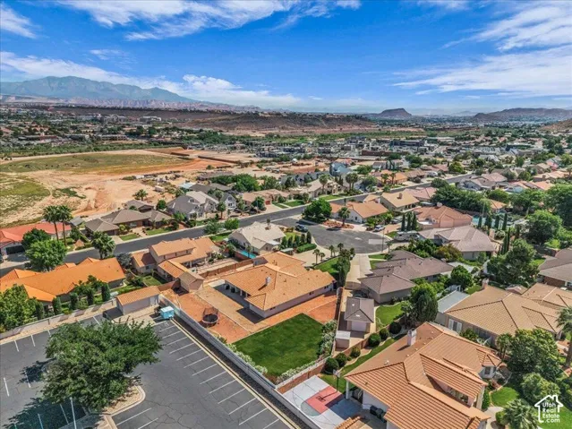 Expansive residential area featuring numerous single-story homes with various roof styles