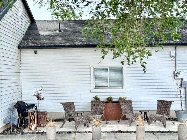 Outdoor patio area featuring a concrete surface
