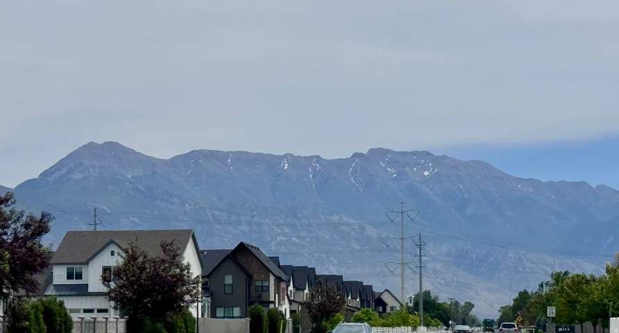 Mountain backdrop with visible peaks
