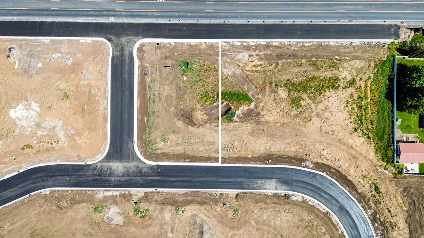 Developed land with paved roads and defined property boundaries