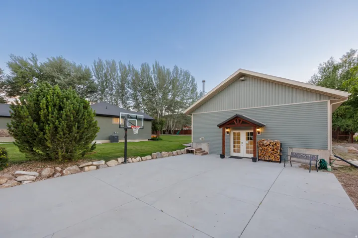 Entrance to the second separate ADU with a large drive way with full RV hookups