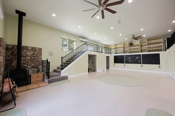 ADU with Spacious interior and wood burning stove.  So many potential uses: apartment, schoolhouse, studio, events, workshop...
