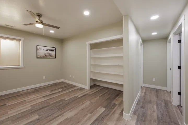 Large Laundry room with space for crafts or workout room.