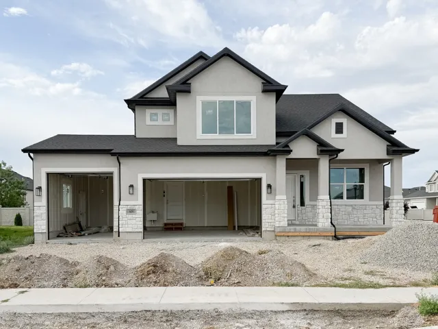 Modern stucco exterior with contrasting dark trim