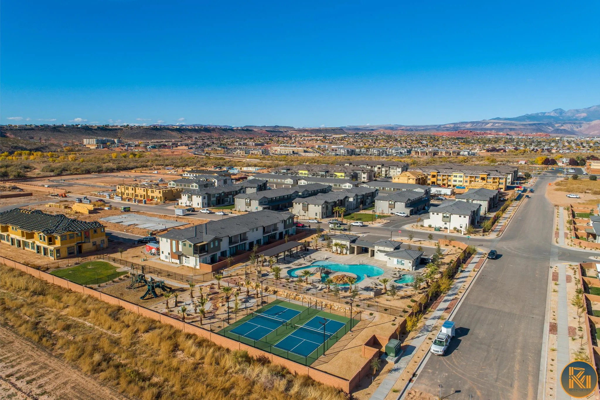 Community amenities featuring a swimming pool, two tennis courts, and a playground