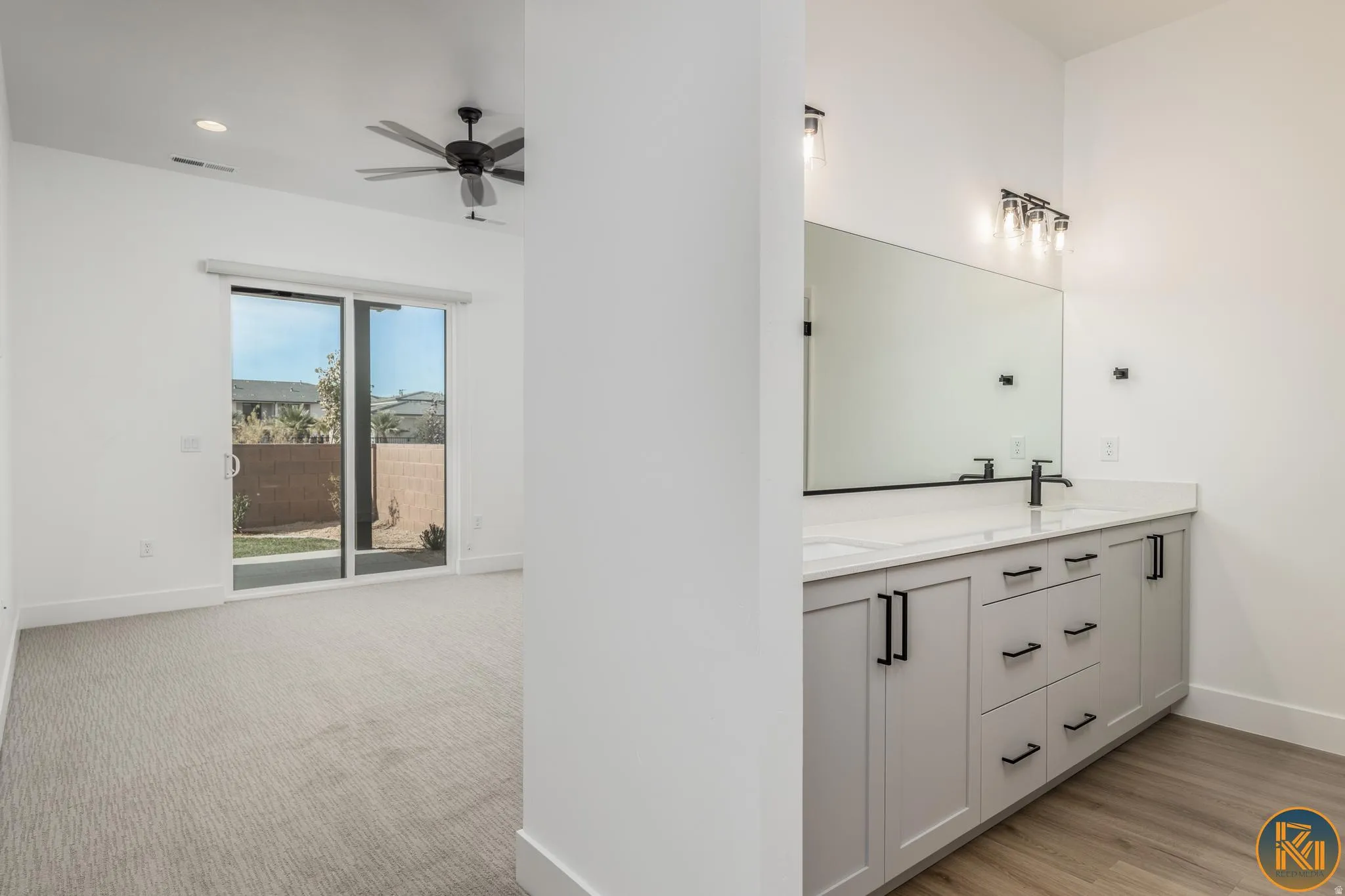 Bright interior with a sliding glass door providing access to an outdoor space