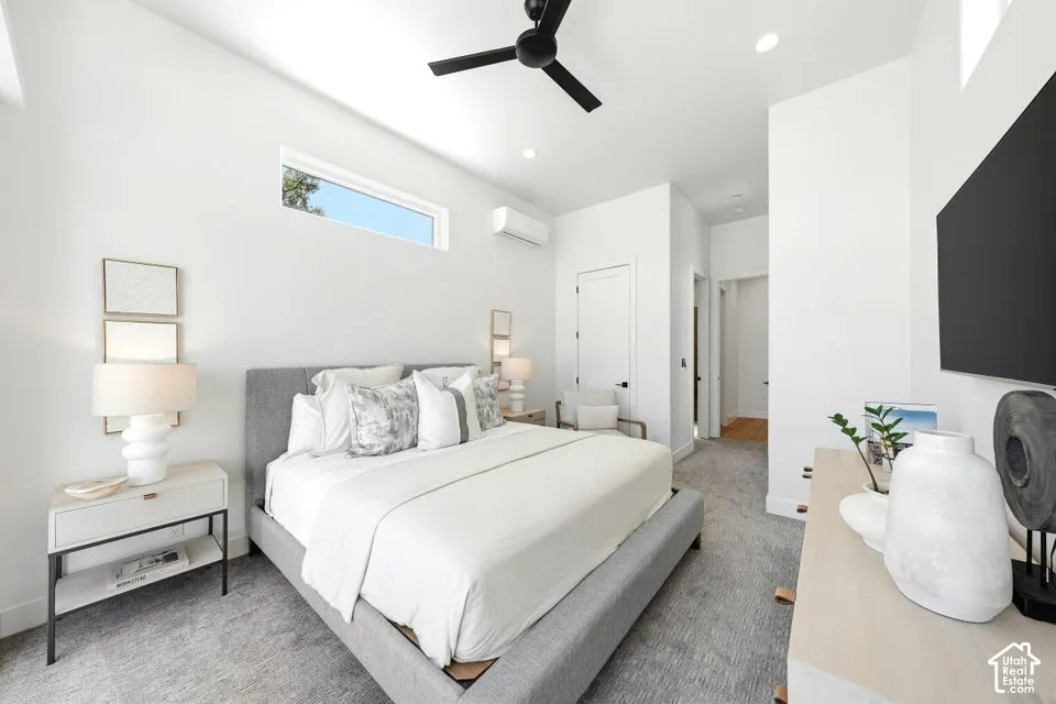 High ceilings featuring a black ceiling fan with recessed lighting