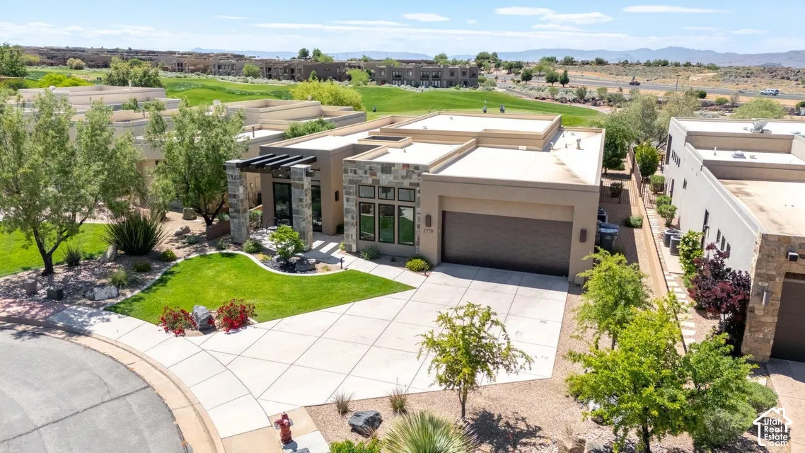 Contemporary architectural design with a flat roofline and stone facade accents