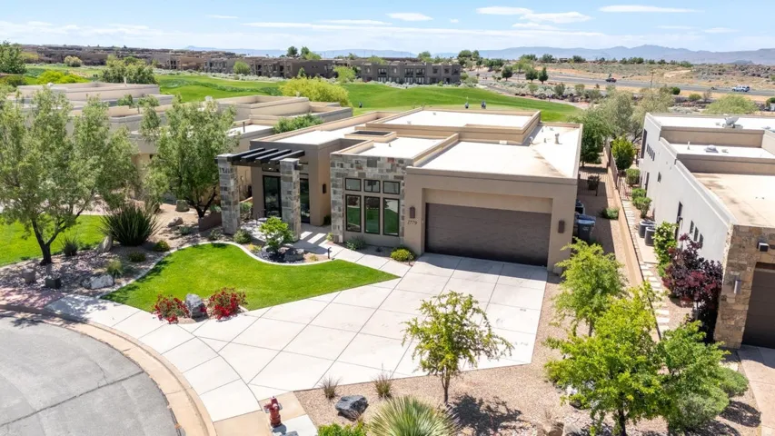 Contemporary architectural design with a flat roofline and stone facade accents