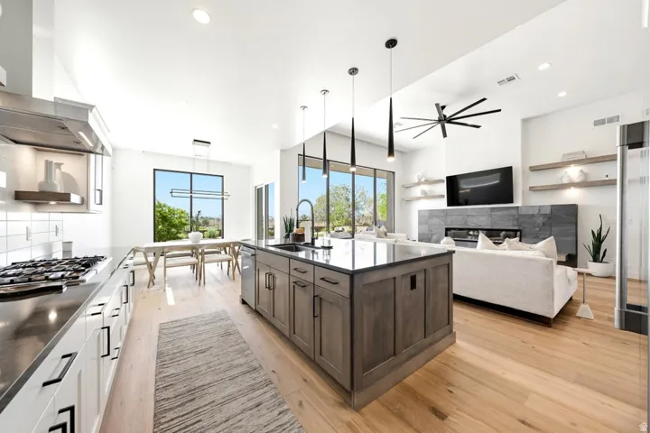 Open-concept living space featuring light wood-finish flooring