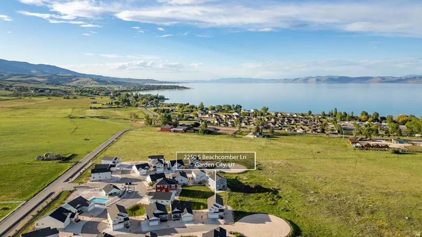 Aerial perspective showcasing a developing residential area with established homes and new construction