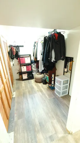 Recessed alcove with wood-finish flooring