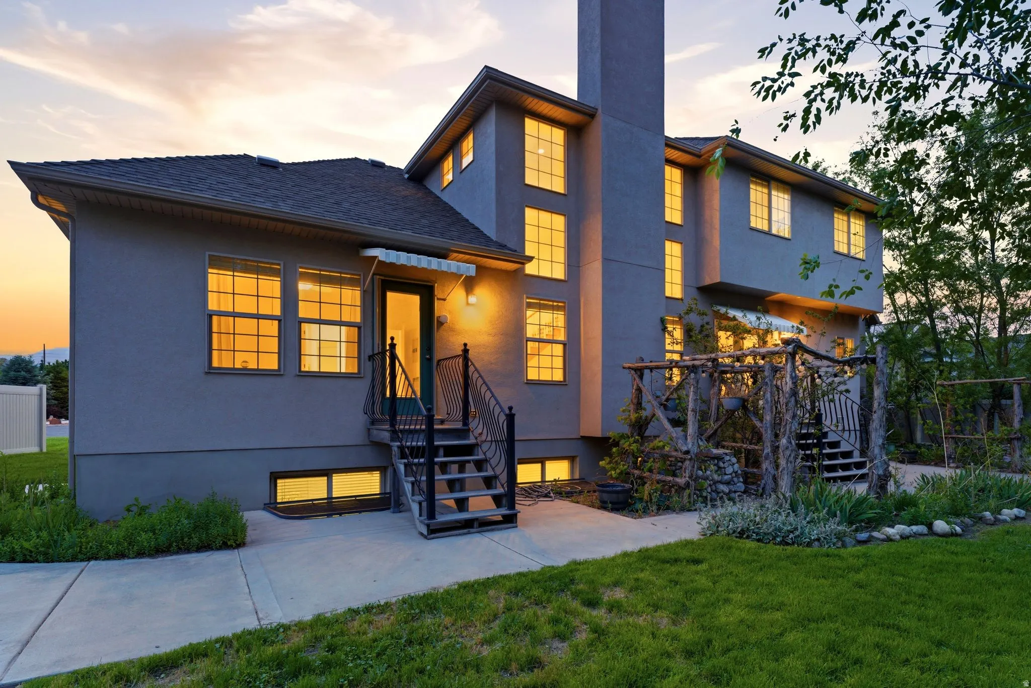 Multi-level stucco exterior with an architectural roofline