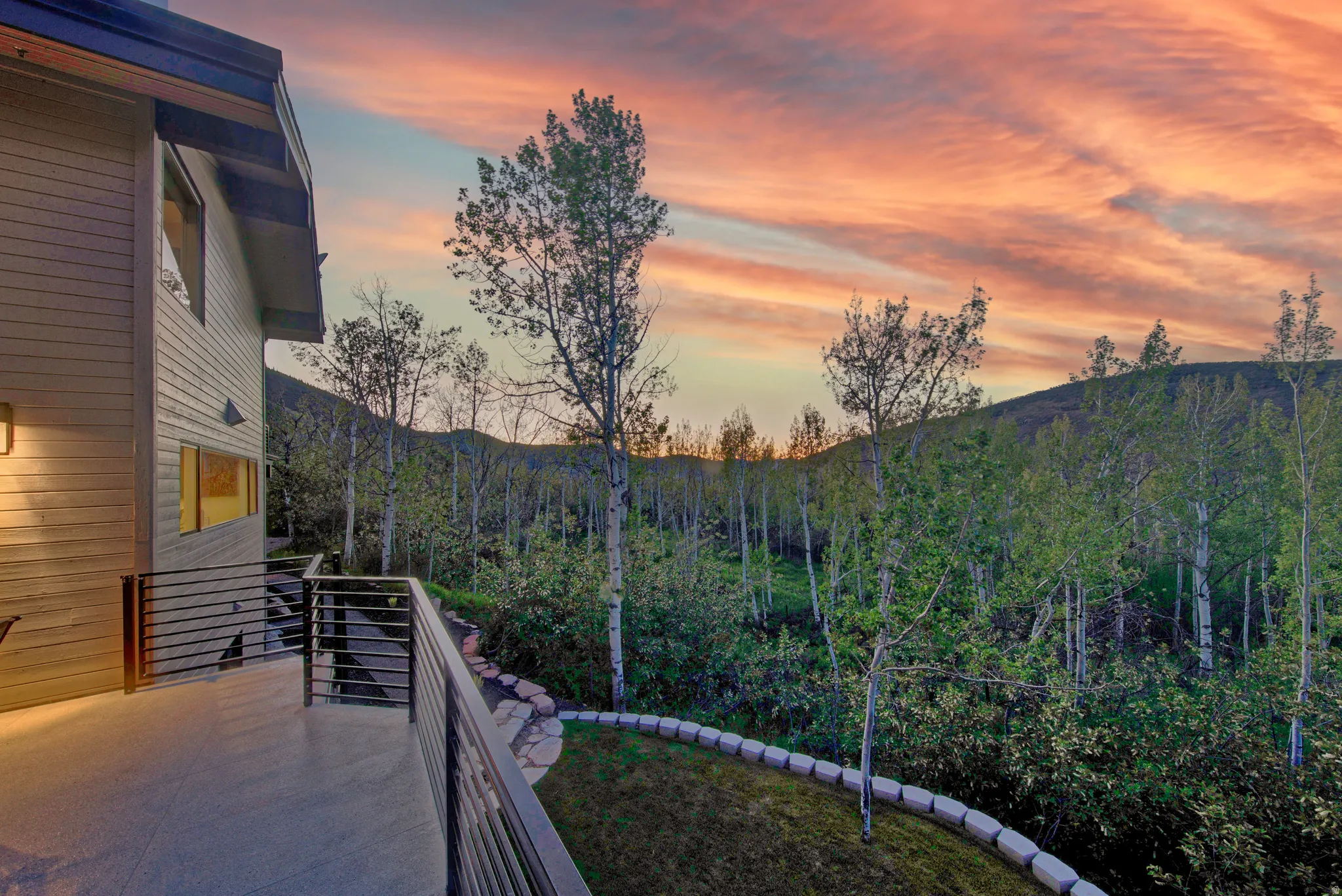 Modern architecture with horizontal siding and an exterior light fixture