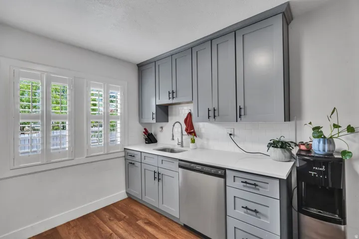 Kitchen featuring gray cabinetry and Stainless appliances
