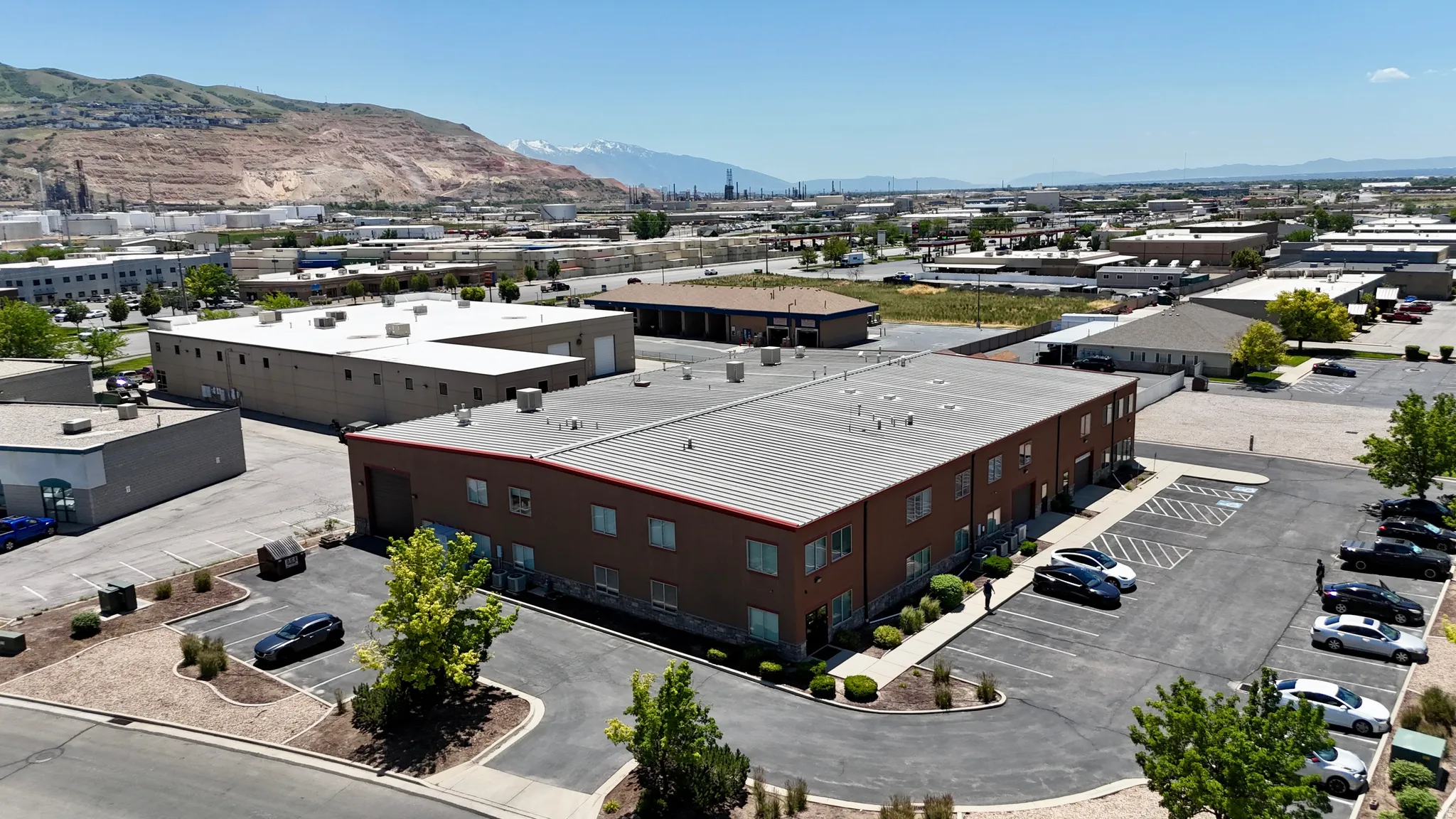 Multi-story commercial building featuring a brick facade and a flat roof