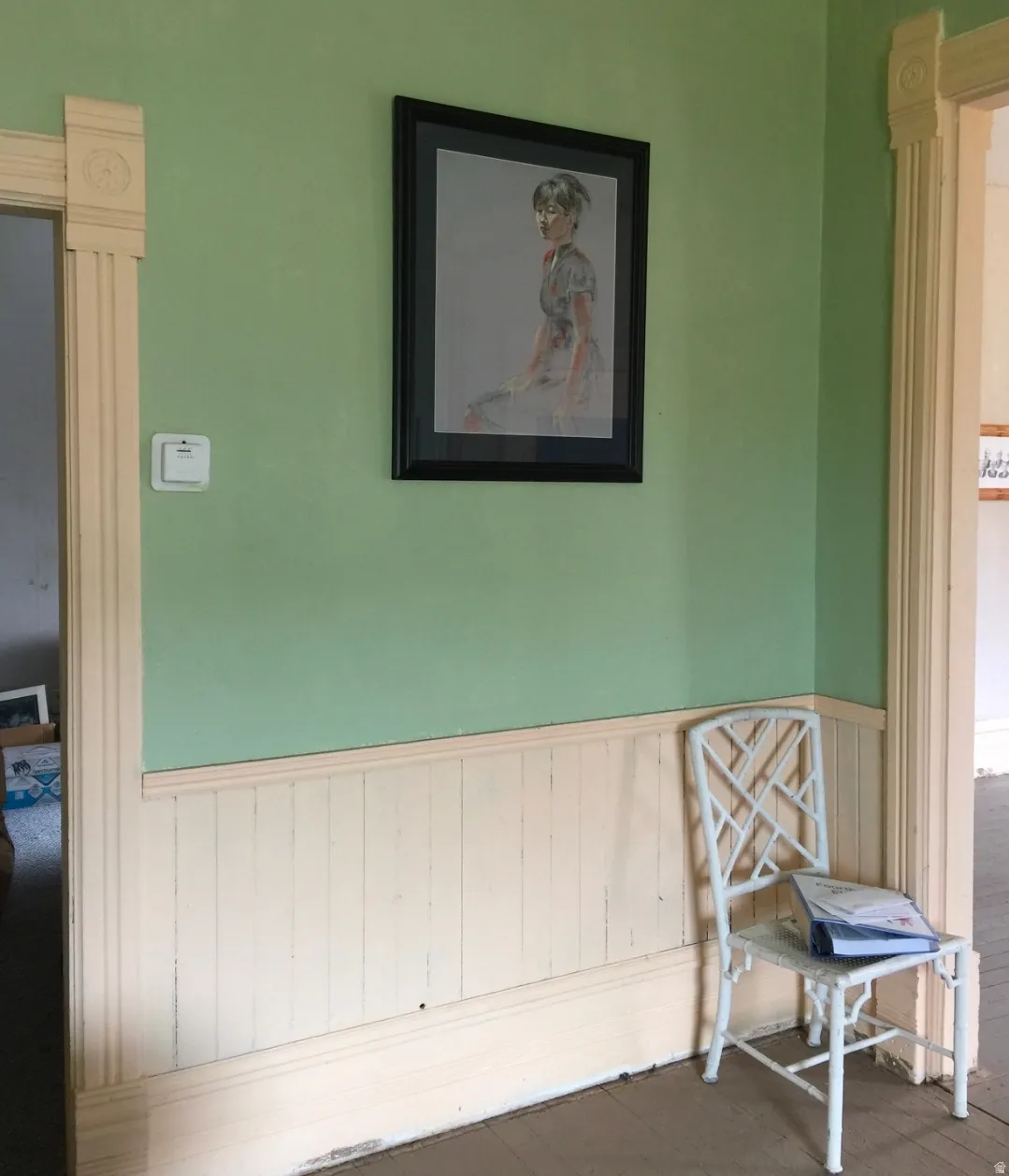 Vertical wood paneling with decorative trim