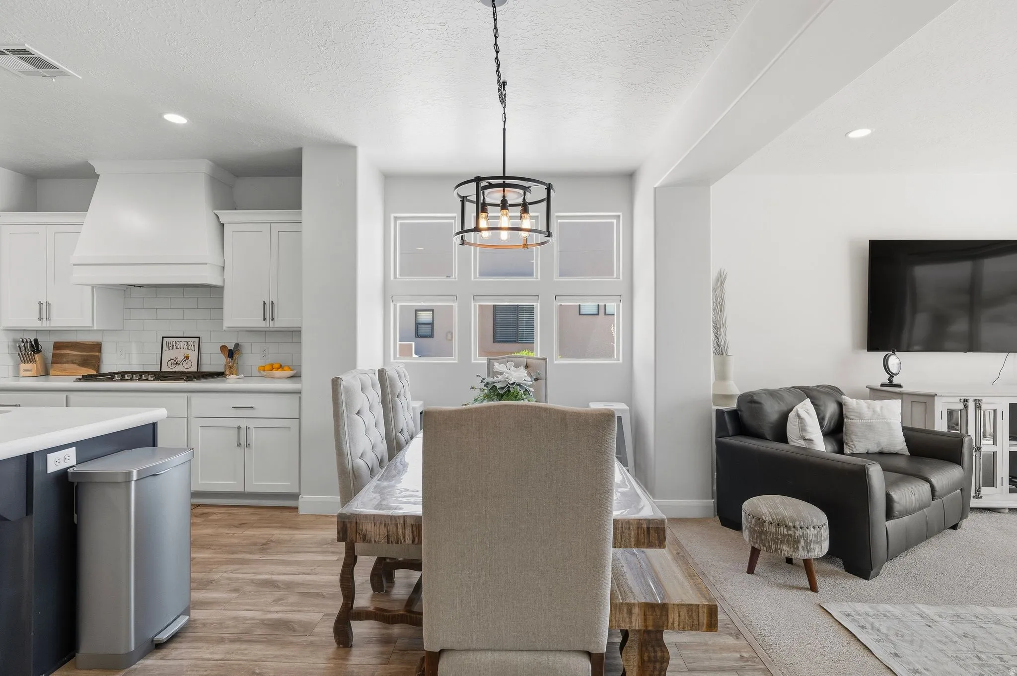 Dining with extra windows and natural light