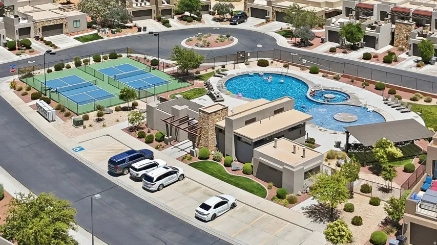 Multi-tiered swimming pool, integrated spa, and sport courts