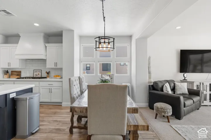 Dining with extra windows and natural light
