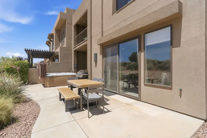Back patio, hut tub, grill, and indoor/outdoor living