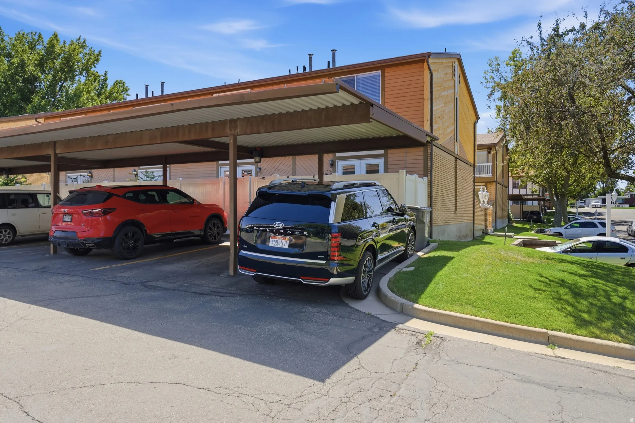 Carport parking featuring 2 parking spots